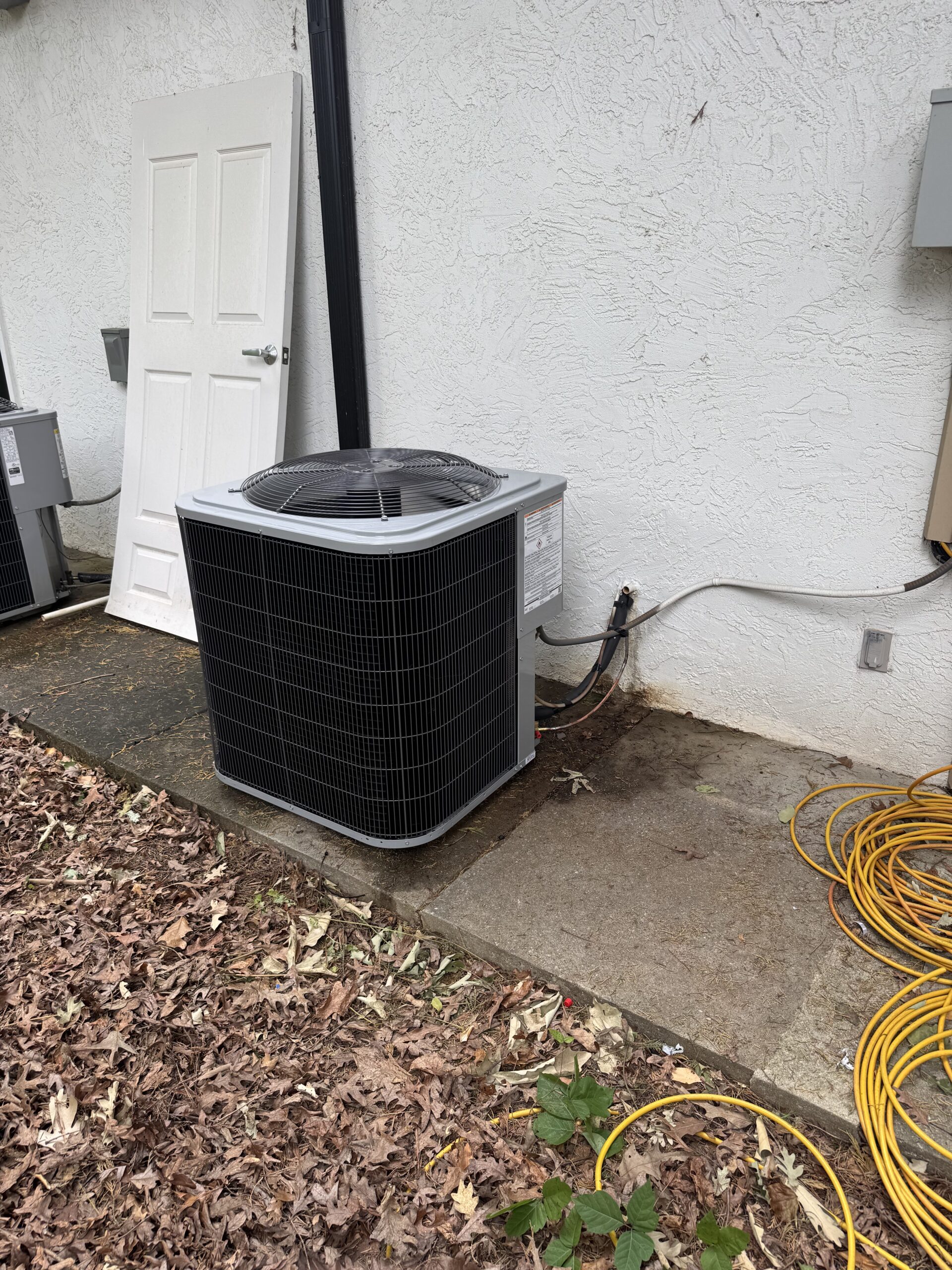 B-Cool technician balancing a multi-zone HVAC system in a Milton home
