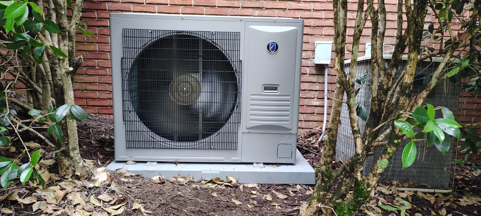 B-Cool HVAC technician on a service call in Roswell, GA
