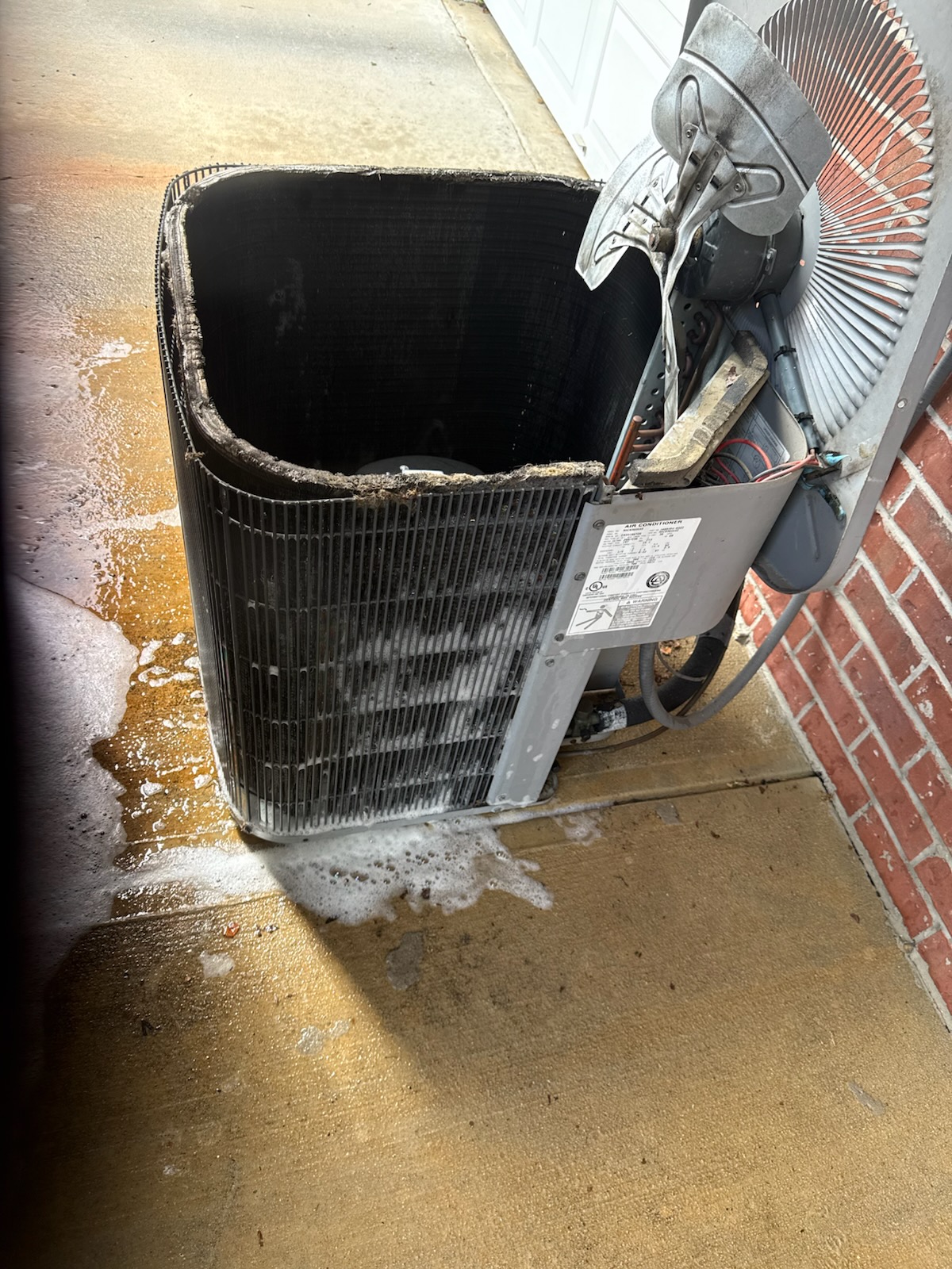 B-Cool HVAC technician performing AC repair in Alpharetta